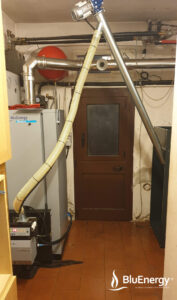 Pellet_boiler_blucalor-E_compact_tank_separated_screw_long_heating_house_BluenergySRL